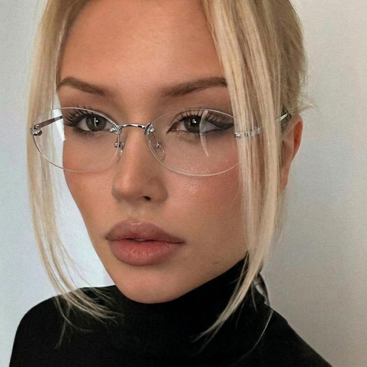 IGnaef Fashion Non Prescription Fake Glasses for Women Blue Light Blocking Oval Frameless IF6303